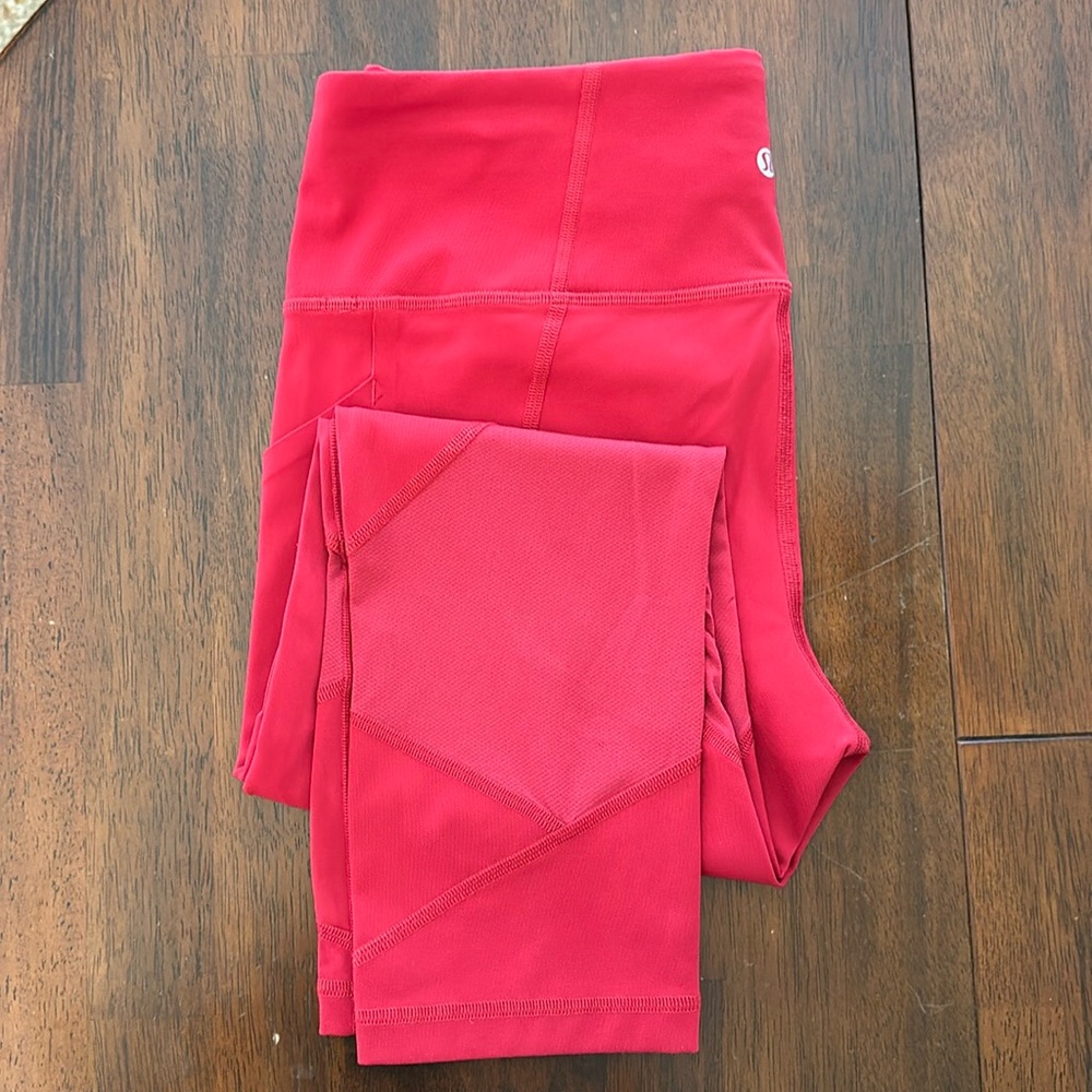 Lululemon high rise 21” leggings.
